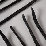 Vanillya Vanille Bourbon 2 kg artisan vanilla beans in a sealed bag, showcasing rich, dark brown color and texture.